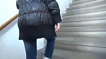 University student record his girlfriend at the campus stairs